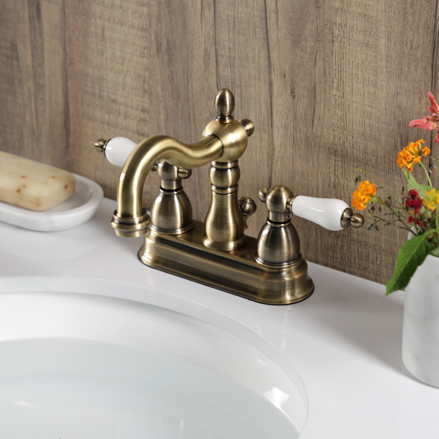 Kingston Heirloom KB1603PL - Heritage Double-Handle 3-Hole Deck Mount 4-Inch Centerset Bathroom Faucet with Pop-Up Drain, Antique Brass — thumbnail 2